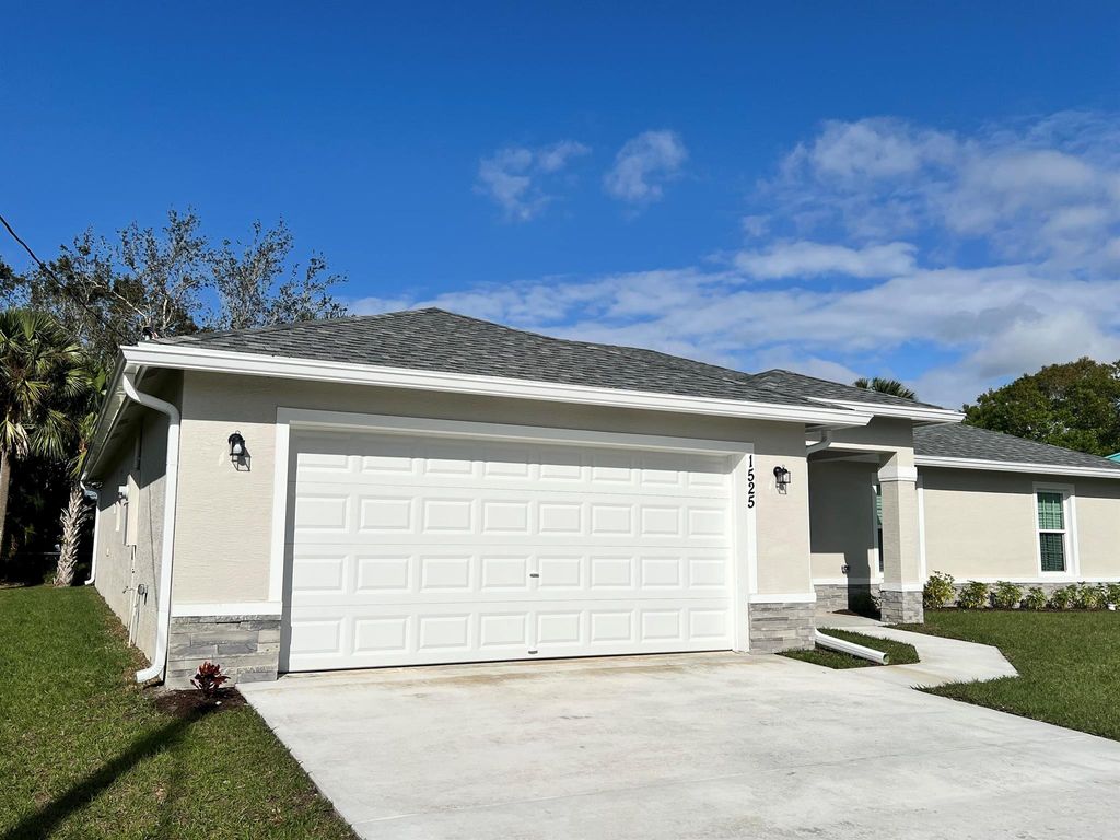 Photo of 1525 SW Urbino Avenue, Port Saint Lucie, FL 34953 (MLS # R11008843)