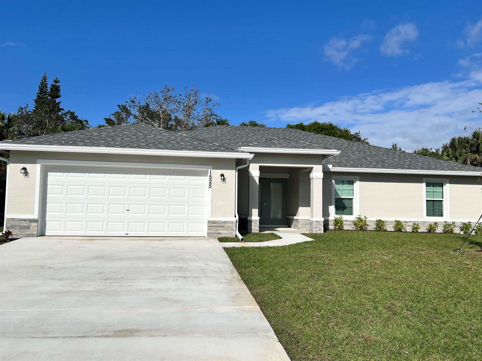 This spacious, brand new 4 bedroom, 2 bath home comes fully equipped with stainless appliances in the gourmet kitchen, brand new tile throughout, covered back patio, and beautiful finishes in both bathrooms. Master bedroom comes with his and hers walk-in closets. Don't miss your opportunity to rent your little piece of Paradise!