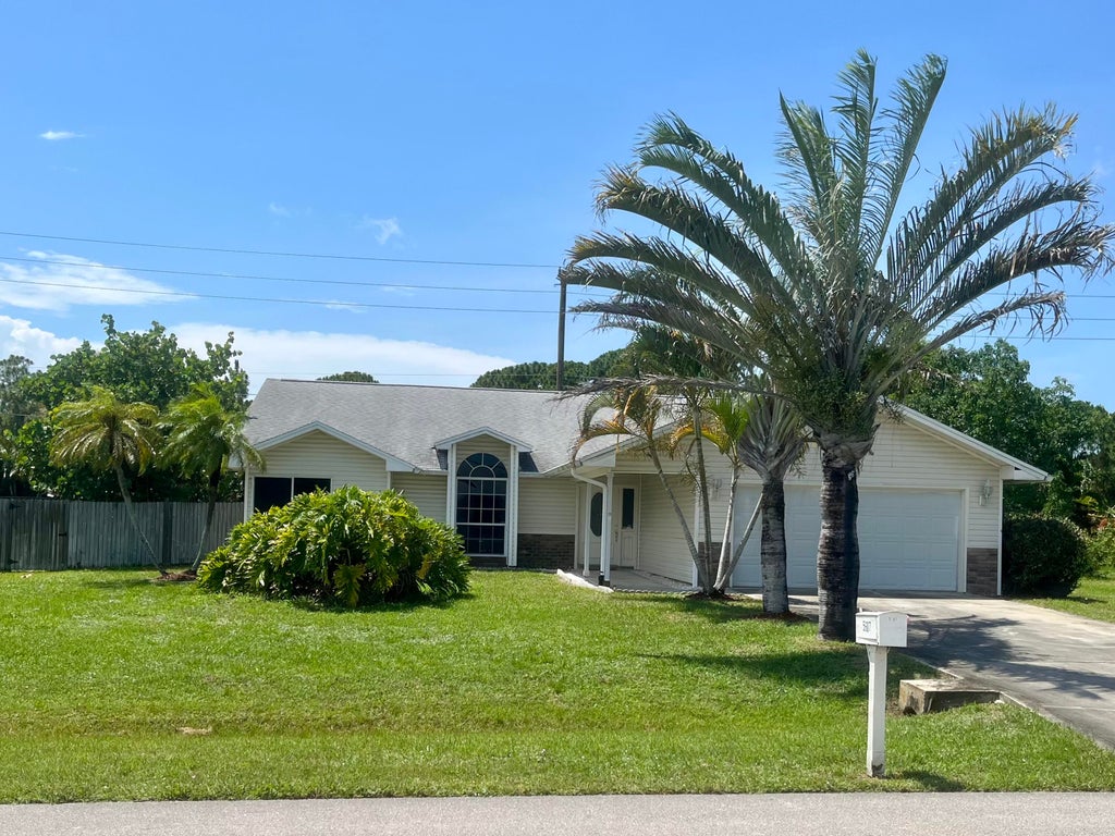 Photo of 5607 Paleo Pines Circle Cir, Fort Pierce, FL 34951 (MLS # R10810361)