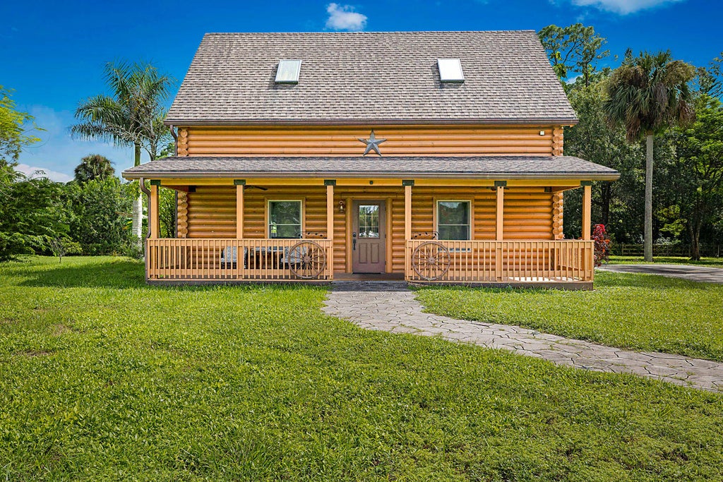 Photo of 14594 GRUBER Lane, Loxahatchee Groves, FL 33470 (MLS # B26091085)