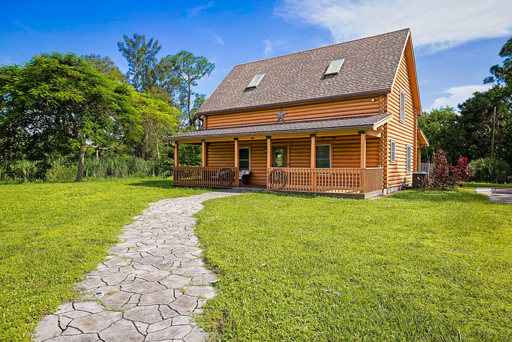 Photo of 14594 GRUBER Lane, Loxahatchee Groves, FL 33470 (MLS # B26091085)