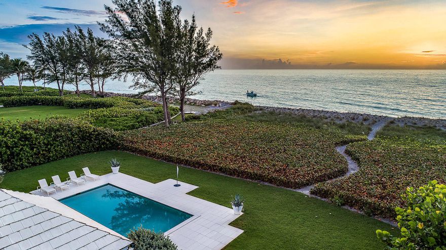 COMPLETELY RENOVATED IN 2012, this spectacular 1 acre direct oceanfront property enjoys 120' of secluded Jupiter Island beach frontage. The sophisticated four bedroom house includes a study and has been finished with beautiful contemporary architectural details throughout. The kitchen incorporates top of the line appliances and the baths are designed with elegant marble and tile. It features large entertaining spaces which overlook an inviting pool area surrounded by lush green lawn. This Island oasis is flooded with light from tall, wide windows and doors and offers SIGNIFICANT EXPANSION POSSIBILITIES up to approx. 7500 to the existing house or one could build a new guest house. Attached two car garage is spacious enough to accommodate golf cart storage and water toys.