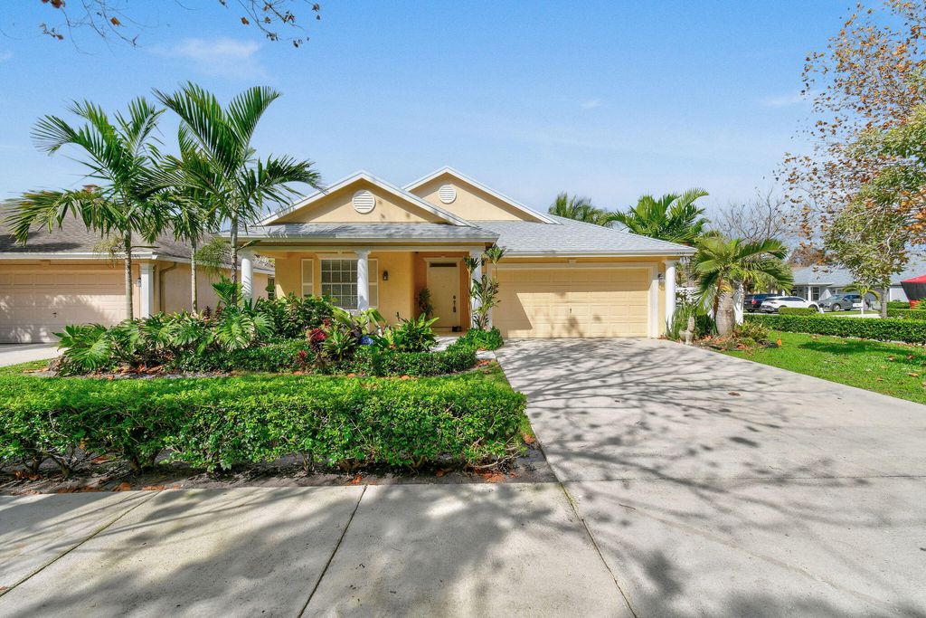 Photo of 350 Clocktower Drive, Jupiter, FL 33458 (MLS # R10971458)