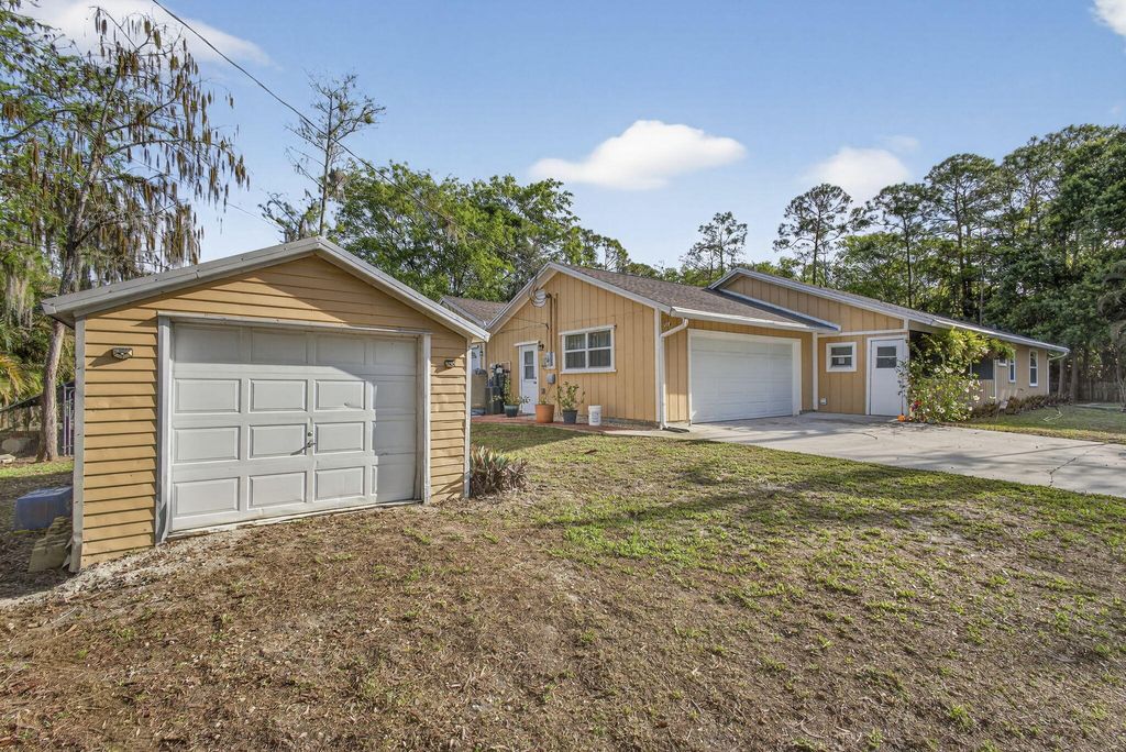 Photo of 16087 E Pleasure Drive, The Acreage, FL 33470 (MLS # B26007168)