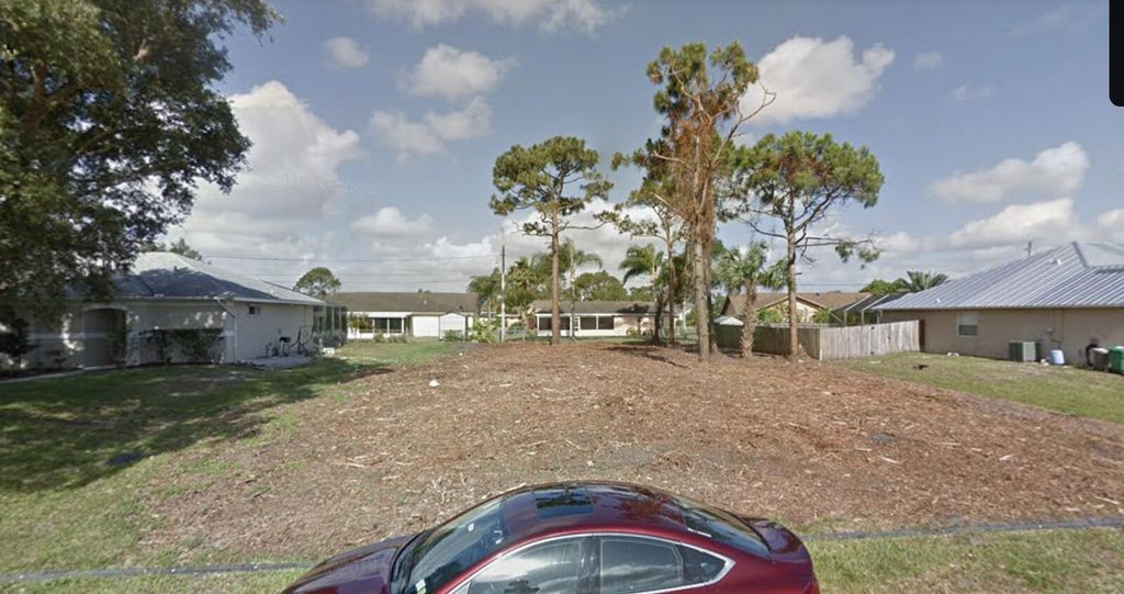 Photo of 6954 NW Hershy Cir, Port Saint Lucie, FL 34983 (MLS # R10909400)
