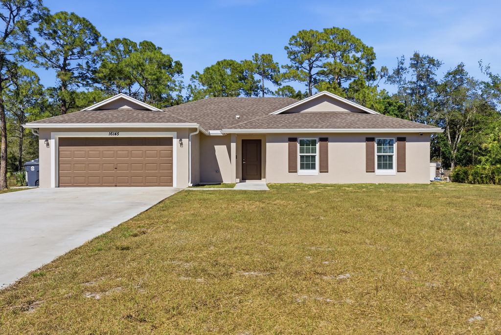 Photo of 16145 E Trafalgar Drive, Loxahatchee, FL 33470 (MLS # R11161588)