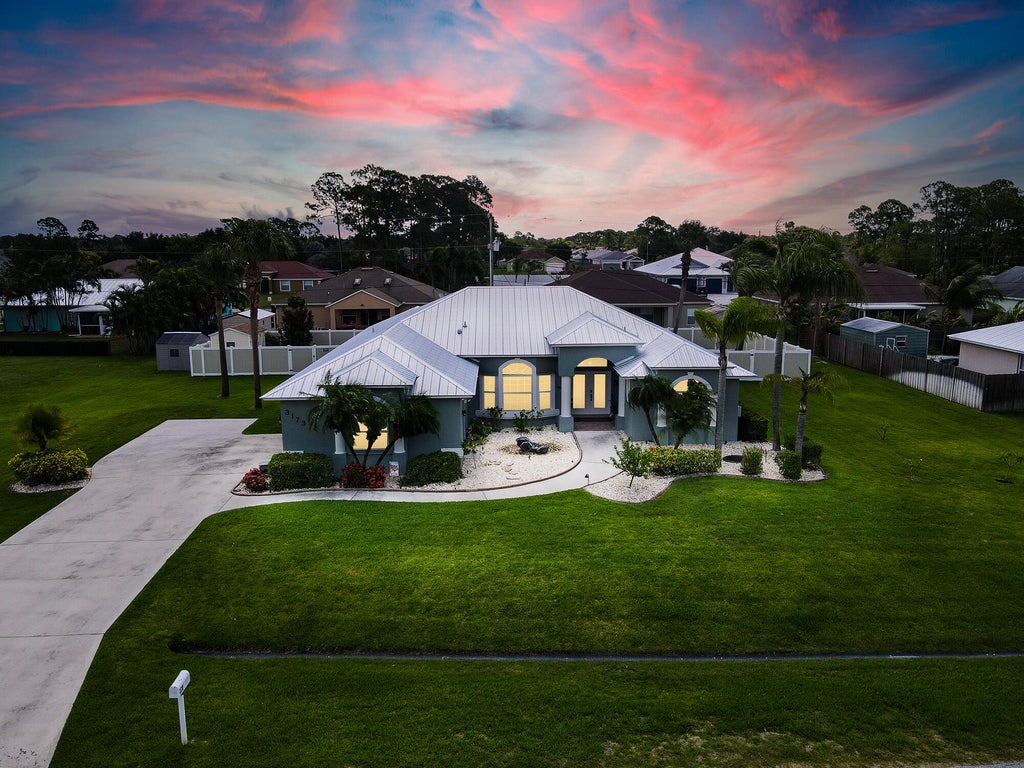 Photo of 3173 SW Armucher Street, Port Saint Lucie, FL 34953 (MLS # R10810560)
