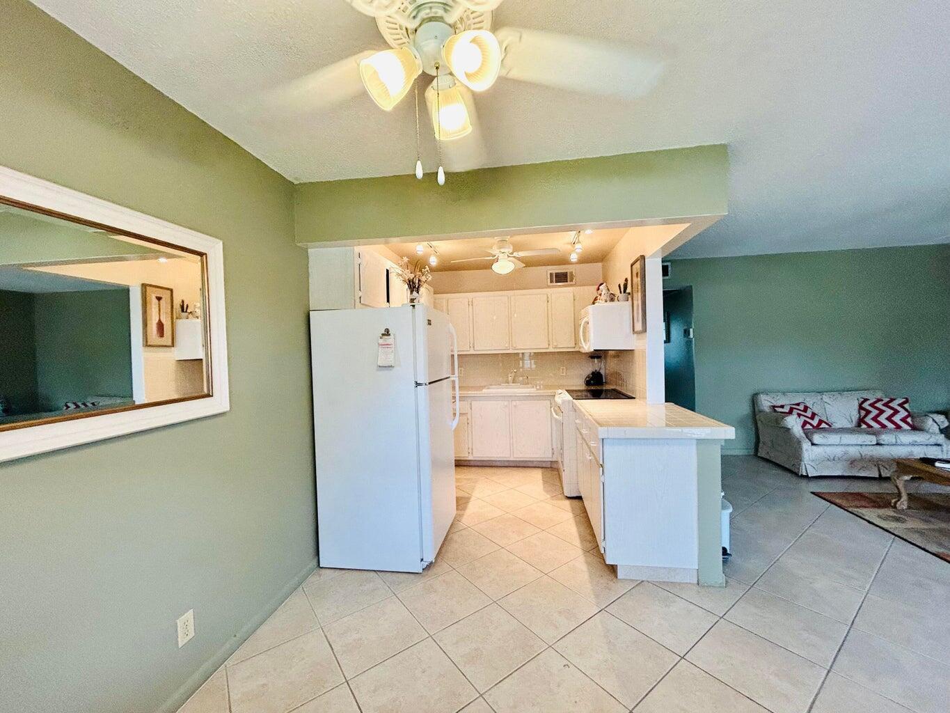 SAY HELLO TO THIS UPDATED 2 BED 1.5 BATH CONDO LOCATED IN THE HIGHLY DESIRABLE CENTURY VILLAGE, A GATED COMMUNITY FOR ACTIVE 55+ ADULTS. OPEN CONCEPT KITCHEN WITH EXTRA LIGHTING,AN ABUNDANCE OF CUPBOARDS AND COUNTER SPACE'. UPDATED BATHROOMS, LARGE TILE FLOORING THROUGHOUT.THIS UNIT IS IS ON THE 2ND FLOOR AND IS BRIGHT AND AIRY. CLOSE TO THE CAMDEN POOL. V WELL MANAGED ASSOCIATION.Roomy closets (one walk-in), laundry room, assigned parking spot plus visitor parking available; local bus for errands/shopping both within & outside The Village; COME AND ENJOY RESORT STYLE LIVING IN THIS GATED COMMUNITY FOR ADULTS 55+. Clubhouse with theater, shows, movies, craft and card rooms, billiards, aerobics, yoga, and dance classes. GREAT LOCATION close to beaches, shopping, restaurants and PBI