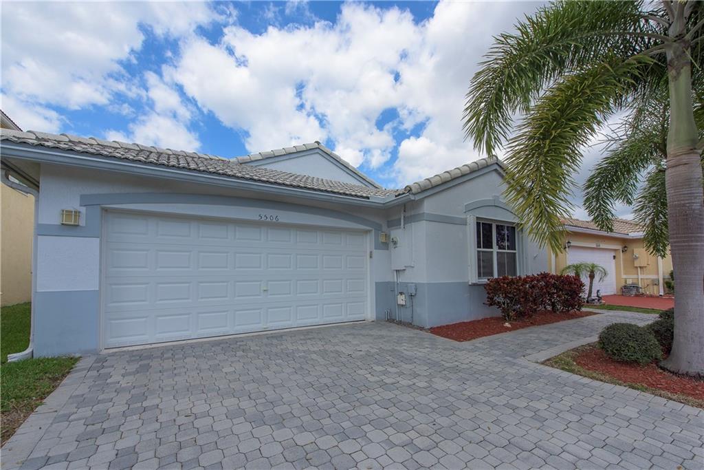 Located In Desirable Wyndham Lakes Gated Coventry Place, w/BEST SCHOOL District in Coral Springs! Beautiful 4 Bed, 2 Bath Home Featuring Screened In Pool, New A/C, New Stainless Steel Appliances, New Hurricane Safe Garage Door, Accordion Shutters, Hurricane Door, Tile Floors Throughout, Ceiling Fans In All Rooms, Alarm System, Water Softener, Tinted Windows, Built In Ceiling Shelving In The Garage & Much More! Back Patio/Pool Area Perfect For Entertaining! Close To Sawgrass Expressway, Shopping & Dinning!