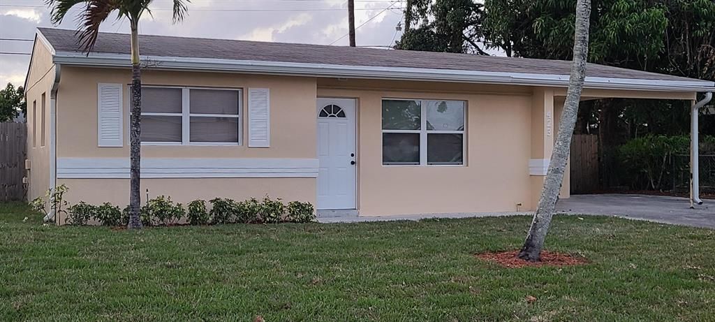 Photo of 423 Pensacola Drive Dr, Lake Worth Beach, FL 33462 (MLS # R10794707)