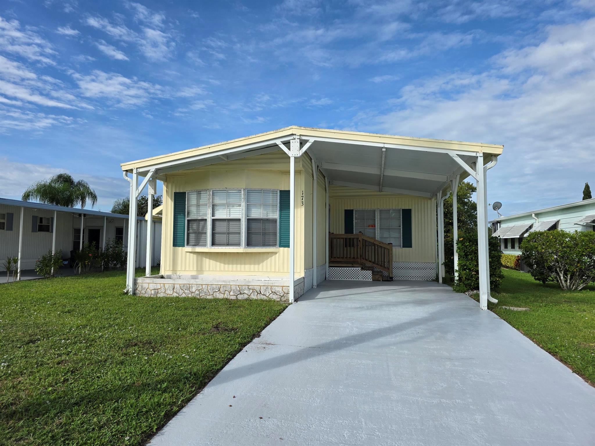 Discover this lakefront gem in Spanish Lakes Riverfront, a vibrant 55+ land lease community where the monthly lot rent is just 867.04 and includes all community ammenities! Enjoy peace of mind with all major updates completed: A/C (2019), roof (2020), and vapor barrier (2020). Inside, you'll find a spacious floor plan ready for your personal touch, giving you the opportunity to bring your vision to life. Fully furnished, this property makes moving in effortless--just bring your suitcase and settle in. With its prime location and extensive upgrades, you won't find another home at this price point. Don't wait--schedule your private showing today and start enjoying the lifestyle you deserve!