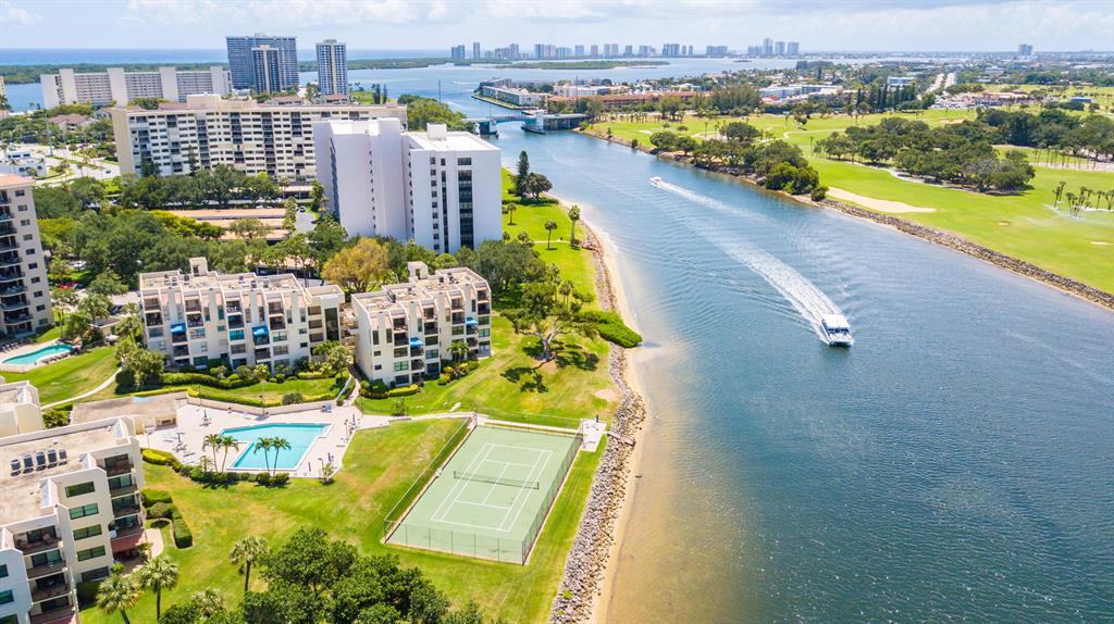 Enjoy spectacular views of the intracoastal waterway from this sizable condo, tucked away in North Palm Beach. Take delight in watching yachts, kayaks & paddleboards sail by, w/ views from the balcony, living rm & master BR. W/ close to 2000 SF, this 2 BR + Den furnished condo offers an abundance of living space. . This condo has impact glass, making it very quiet & peaceful. The Everglades is a boutique condominium, situated directly on the intracoastal, w/ views of multi-million dollar homes & the NPB Golf Course. Located just minutes from Palm Beach Airport, Jupiter & Juno Beaches, shopping, restaurants -Palm Beach County' Very Best!