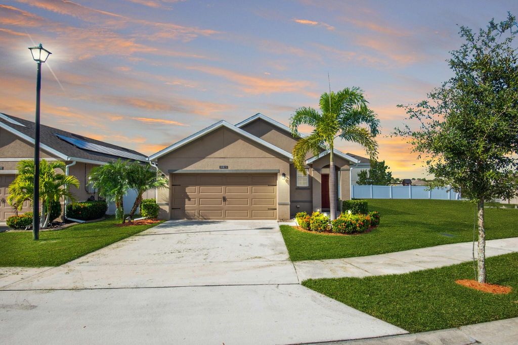Photo of 10021 SW Newberry Avenue, Port Saint Lucie, FL 34987 (MLS # R10951830)