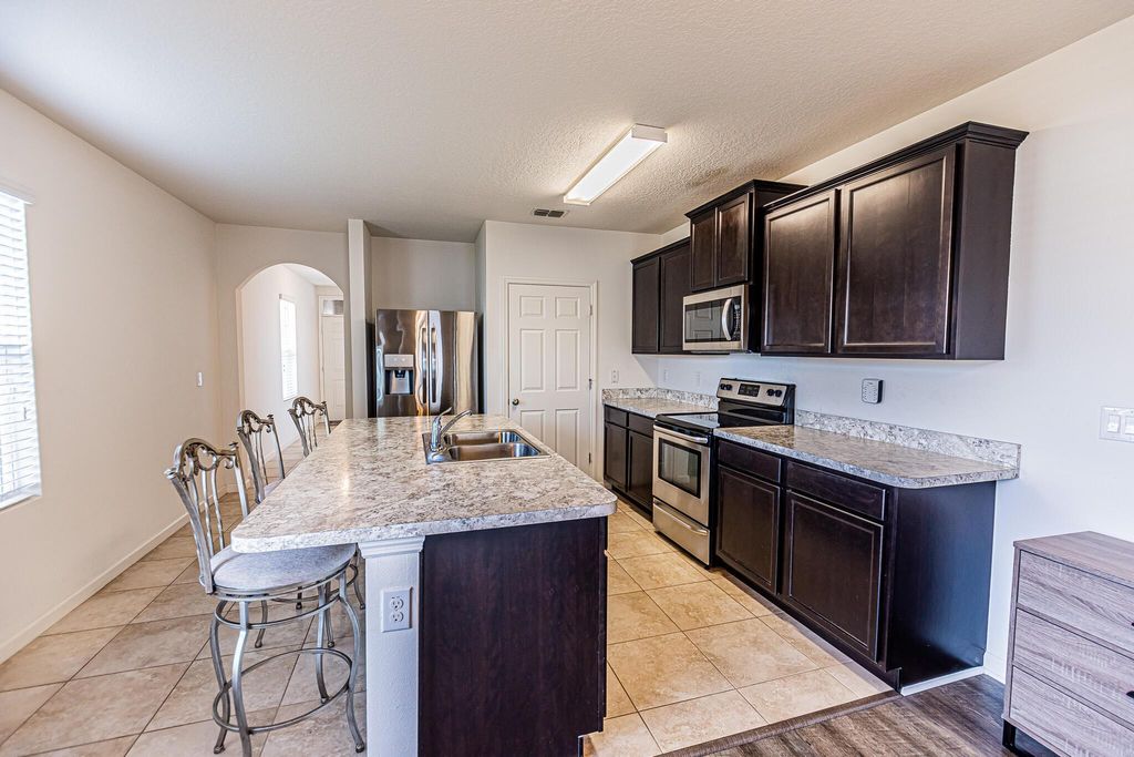 Photo of 10021 SW Newberry Avenue, Port Saint Lucie, FL 34987 (MLS # R10951830)