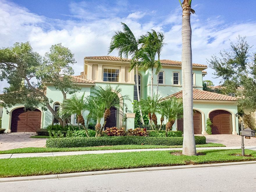 A magnificent Courchene home features five bedroom suites, six full and two half bathrooms with a three-car garage. This is a majestic Mediterranean inspired two-story custom home located in world class Mirasol Country Club offering premier luxury amenities.With a desirable floor plan, this home includes exquisite finishes and the finest architectural details. Quality craftsmanship and attention to detail goes unnoticed throughout this home.Exterior features include impact glass windows and doors, circular driveway with a wrought iron gate at the entrance. Come into an elegant foyer, leading you into a spacious formal living room highlighted bya beautifully designed fireplace and custom built-ins on each side.