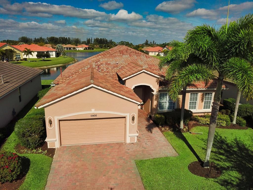 Photo of 11400 SW Aspen Lane, Port Saint Lucie, FL 34987 (MLS # R10687057)