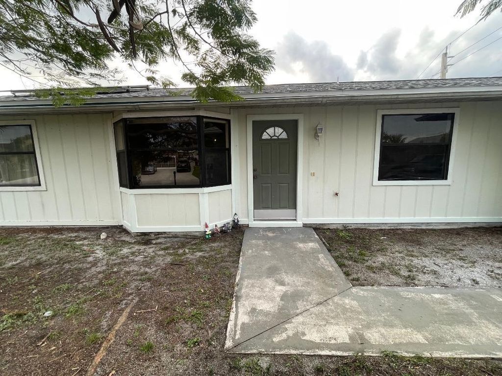 Photo of 3302 SW Frankford Street, Port Saint Lucie, FL 34953 (MLS # R10958096)