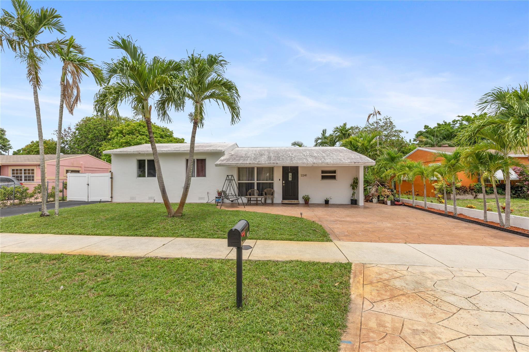 The perfect property for an investor or large families! This spacious 4-bedroom, 3-bath single-family home includes a converted garage with private entry, offering rental income potential of approximately $1,500/month. There’s also a detached 1-bedroom, 1-bath guest house with private entry, currently rented for $1,500/month. The property offers a fenced-in yard and plenty of parking space for cars, trucks, or boats. Prime location only minutes away from Hard Rock Guitar Casino, Fort Lauderdale Beach, Dania Beach, FLL International Airport, and all the major highways (Turnpike, I-95, 595). No Rental Restrictions or HOA. Some photos have been digitally modified, home needs a new roof.