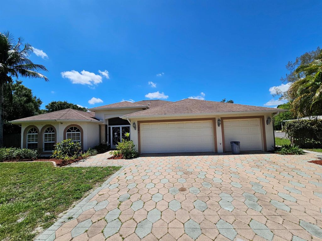 Photo of 1201 E Easy Street, Fort Pierce, FL 34982 (MLS # R10896445)