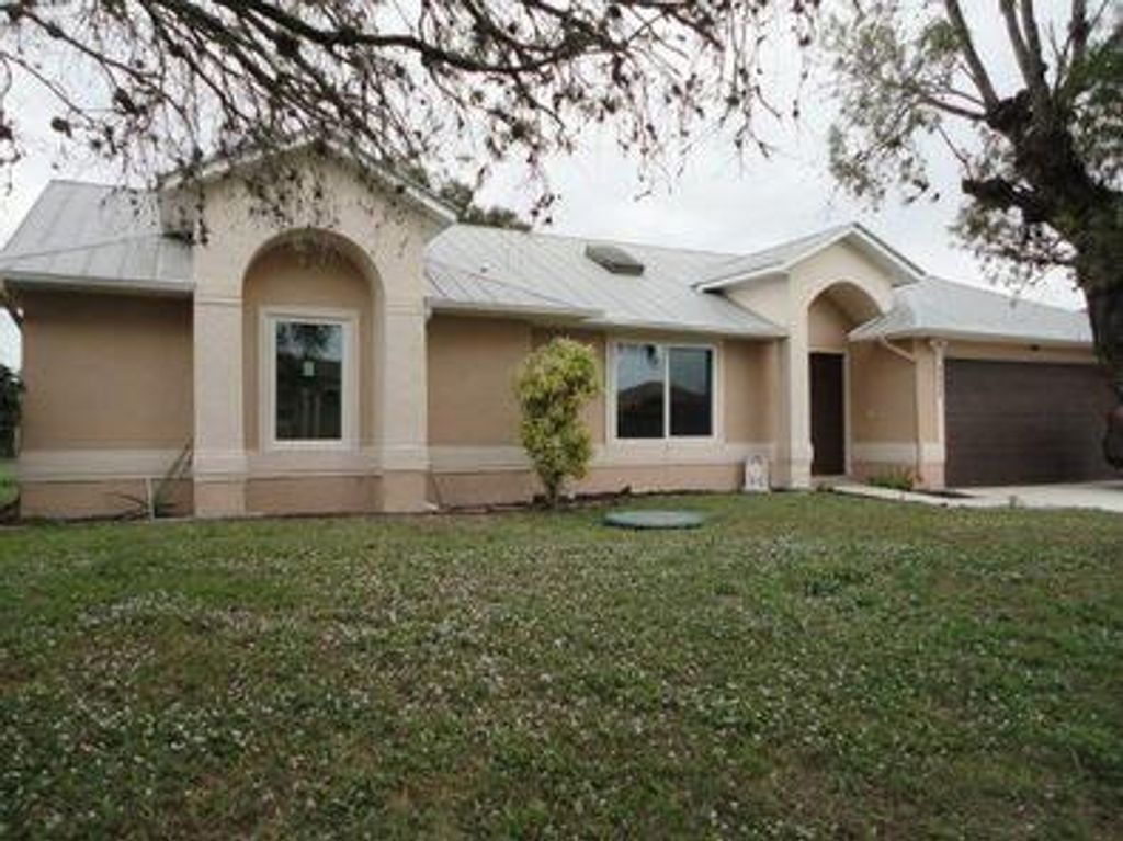 Photo of 3825 SW Koba Street, Port Saint Lucie, FL 34953 (MLS # R10944838)