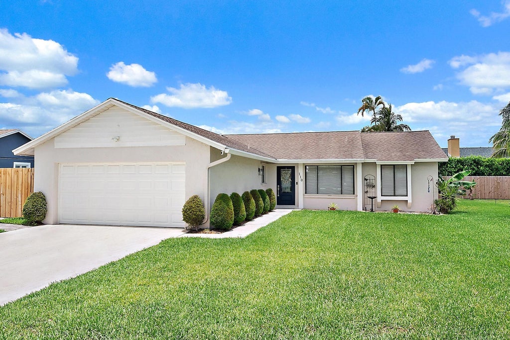Photo of 110 Parkwood Drive, Royal Palm Beach, FL 33411 (MLS # R11094271)