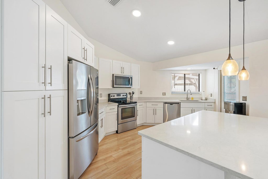 Photo of 110 Parkwood Drive, Royal Palm Beach, FL 33411 (MLS # R11094271)