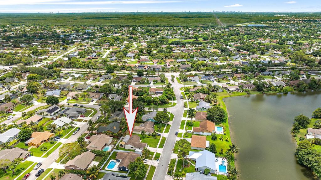 Photo of 110 Parkwood Drive, Royal Palm Beach, FL 33411 (MLS # R11094271)
