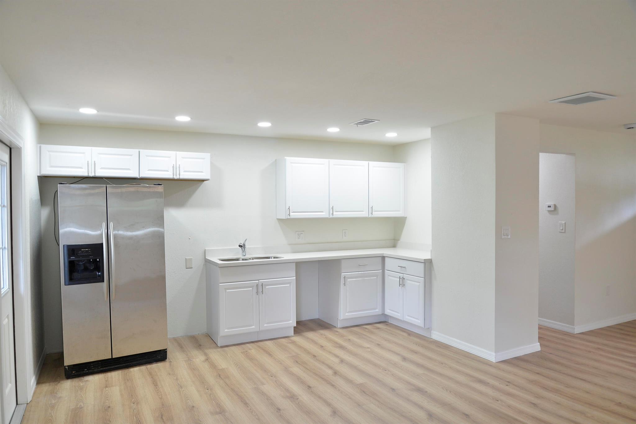 Fenced in Yard , The renovated interiors are designed with an open floor plan, offering a sense of spaciousness and ease of flow between rooms. No HOA , pets are Wercomed