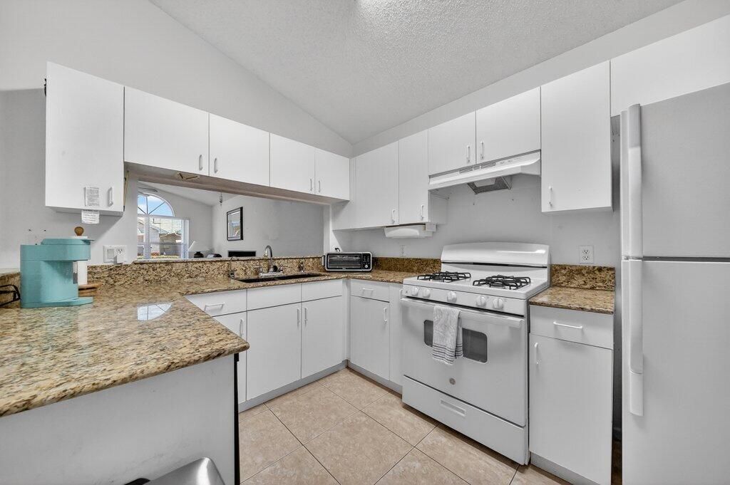 Photo of 1178 NW Lombardy Drive, Port Saint Lucie, FL 34986 (MLS # R11156252)