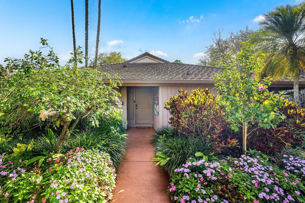 Photo of 7077 Rain Forest Drive, Boca Raton, FL 33434 (MLS # B26015014)