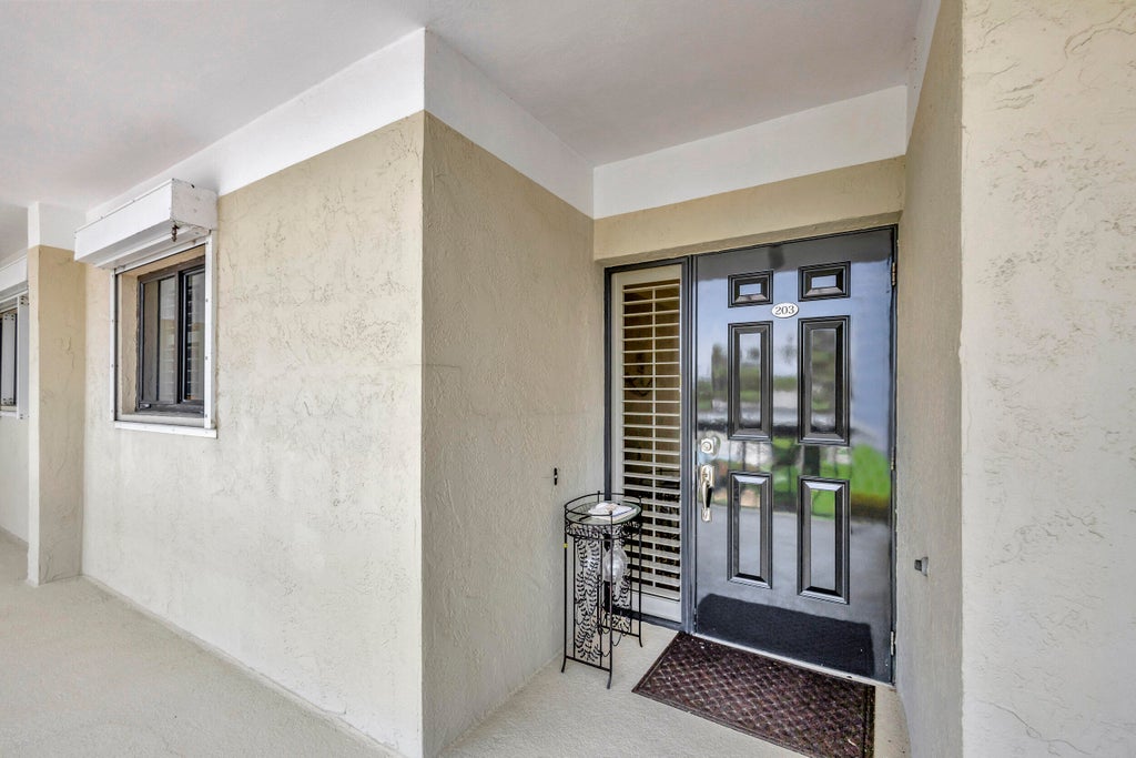 Photo of 70 CELESTIAL Way #203, Juno Beach, FL 33408 (MLS # B26073897)