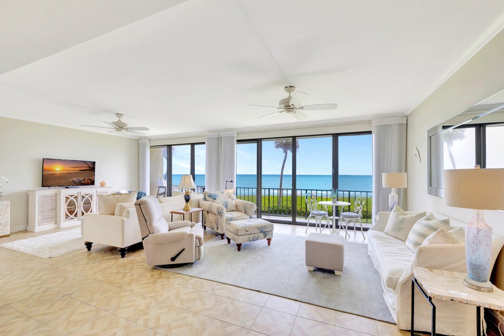 Photo of 70 CELESTIAL Way #203, Juno Beach, FL 33408 (MLS # B26073897)