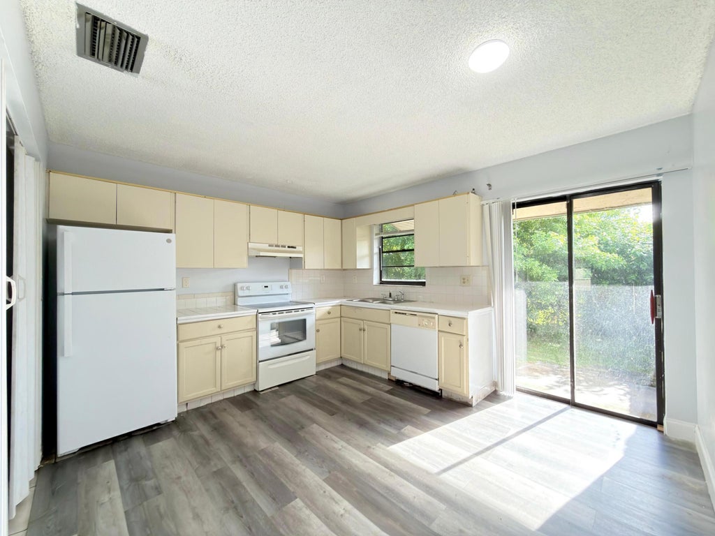 Photo of 4885 Badger Road, West Palm Beach, FL 33417 (MLS # B26080062)