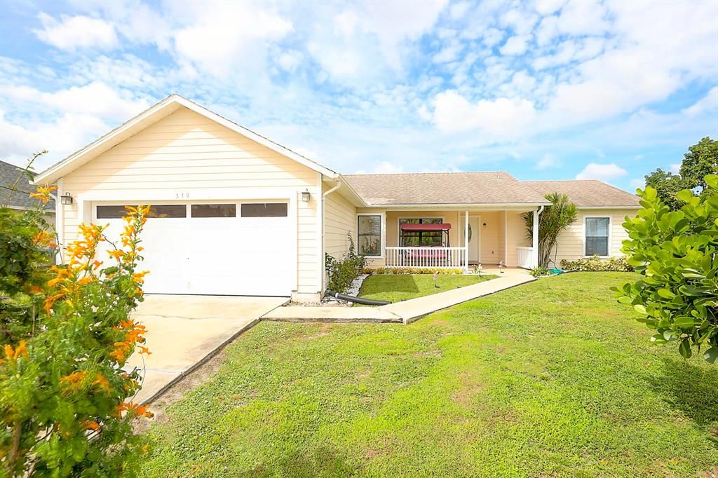 Photo of 519 SW Dailey Avenue, Port Saint Lucie, FL 34953 (MLS # R10749368)