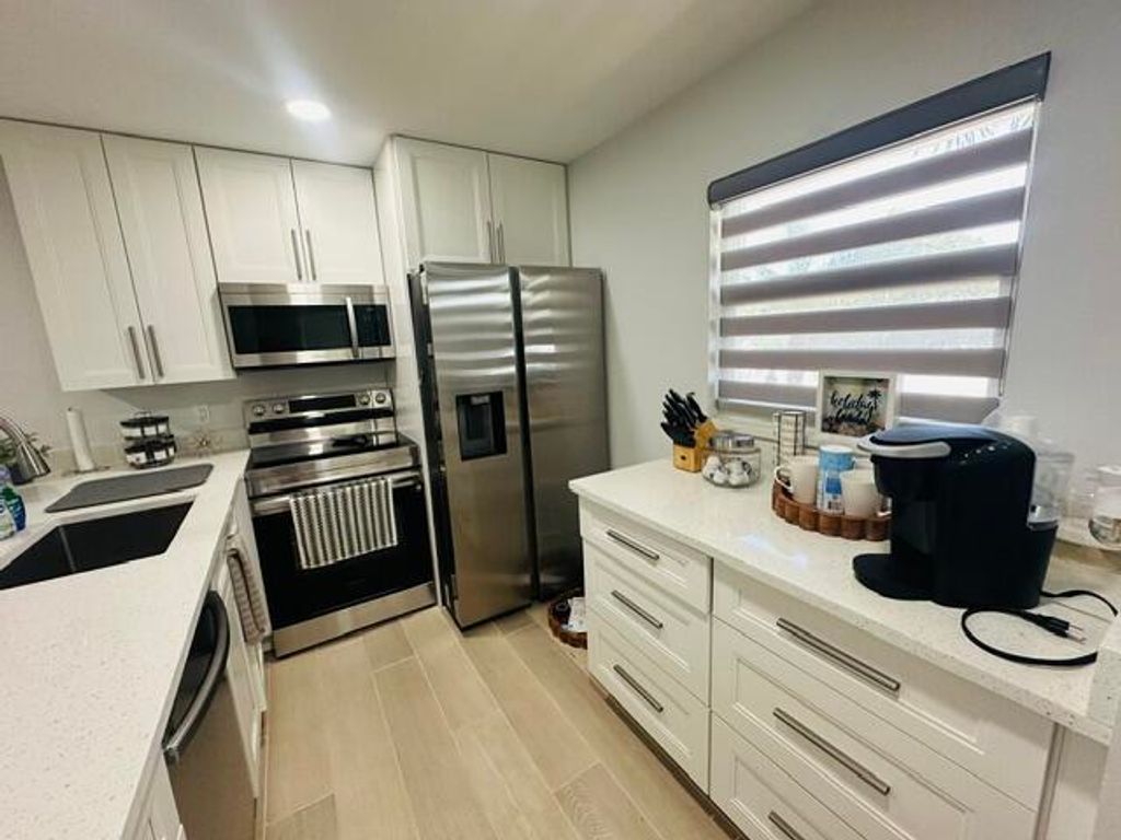 Photo of 2601 NE 3rd Court #1050, Boynton Beach, FL 33435 (MLS # B26031272)