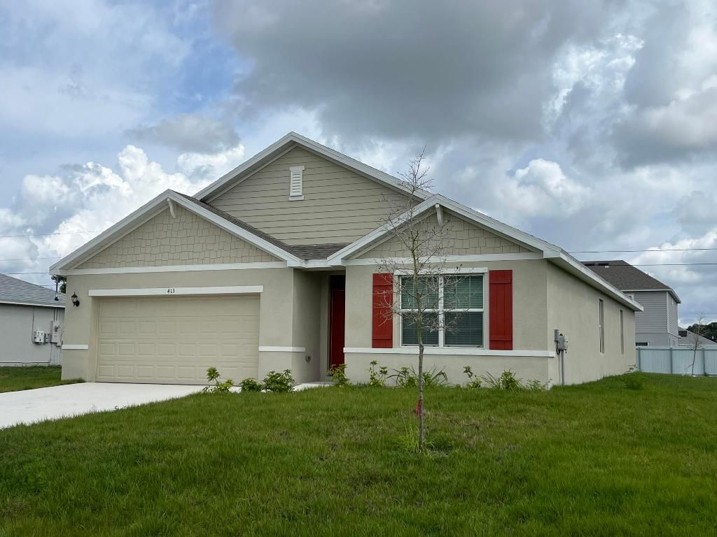 Photo of 413 SW Lakota Avenue, Port Saint Lucie, FL 34953 (MLS # R11155611)