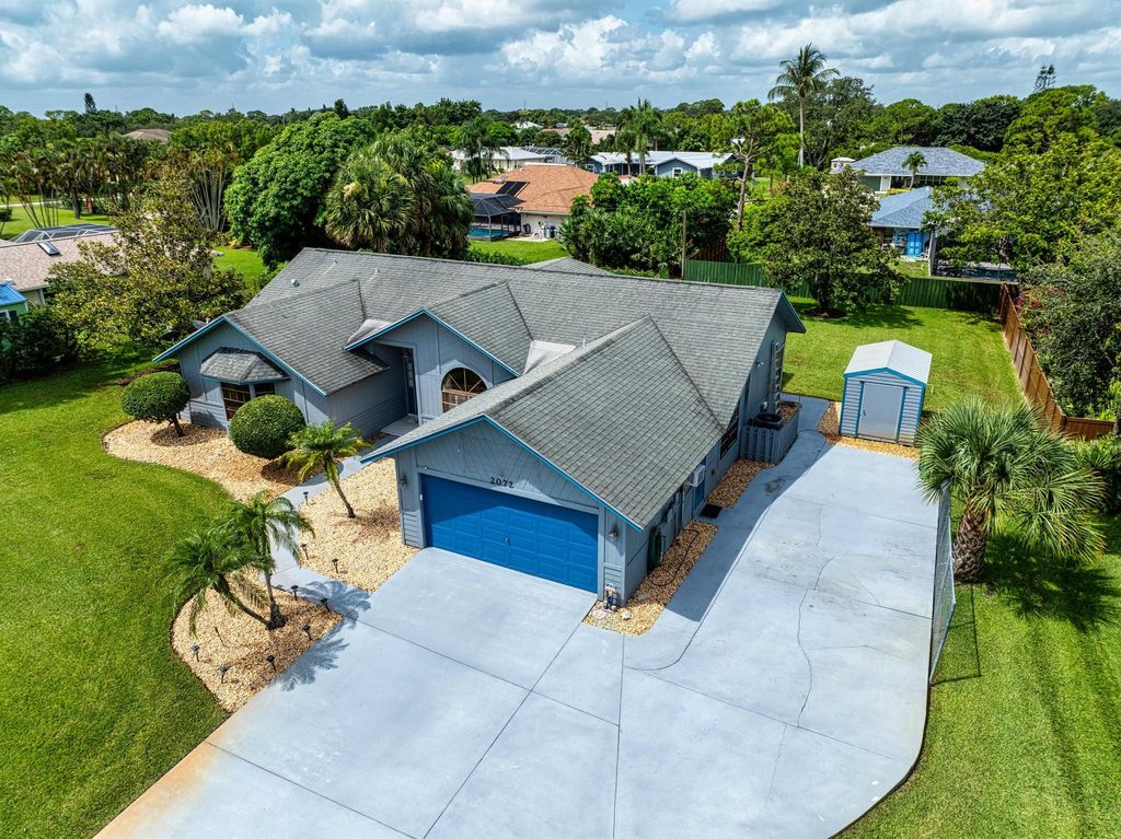 Photo of 2072 SE Bisbee Street, Port Saint Lucie, FL 34952 (MLS # R11106977)