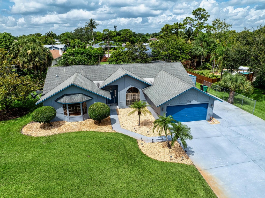 Photo of 2072 SE Bisbee Street, Port Saint Lucie, FL 34952 (MLS # R11106977)