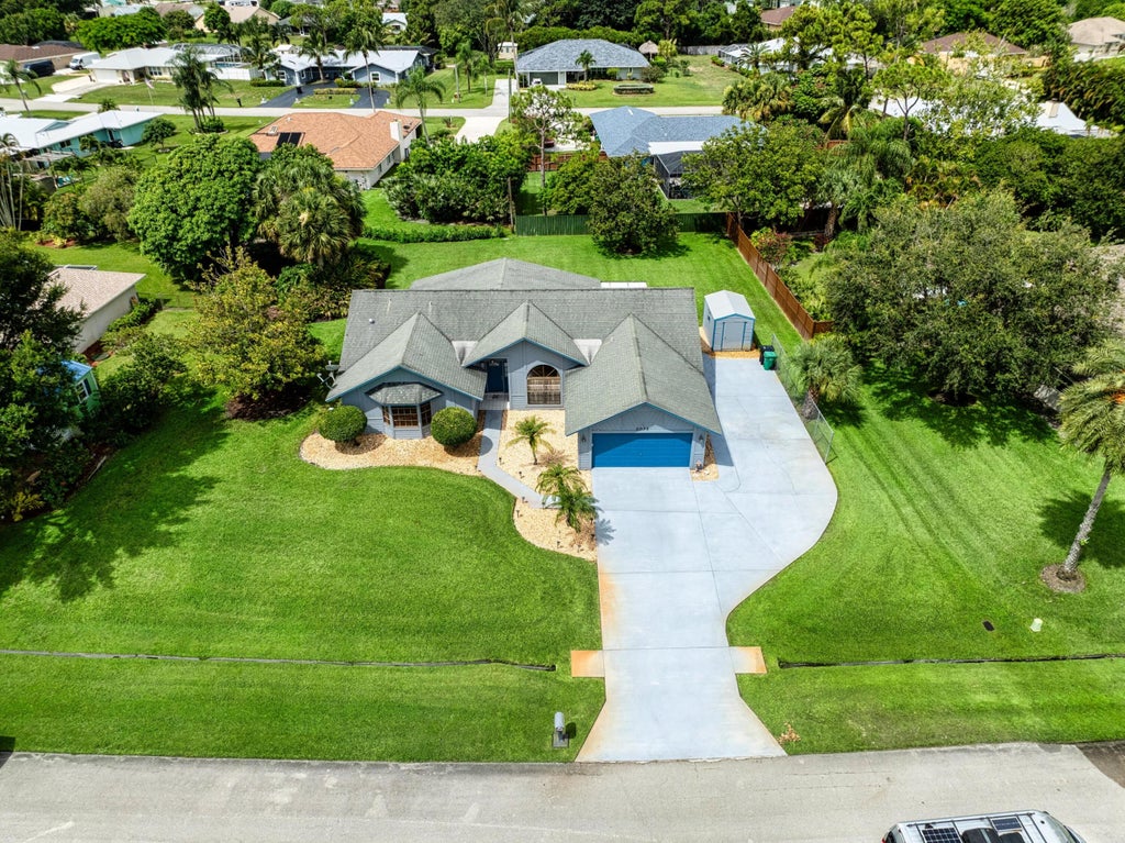 Photo of 2072 SE Bisbee Street, Port Saint Lucie, FL 34952 (MLS # R11106977)