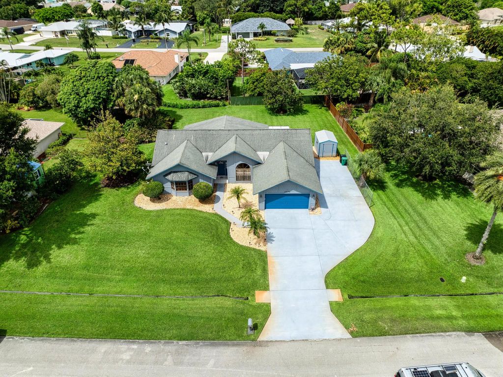 Photo of 2072 SE Bisbee Street, Port Saint Lucie, FL 34952 (MLS # R11106977)