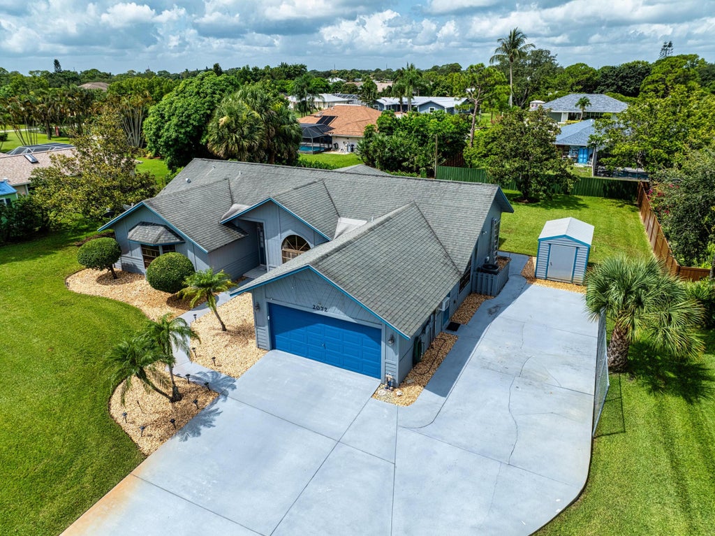 Photo of 2072 SE Bisbee Street, Port Saint Lucie, FL 34952 (MLS # R11106977)