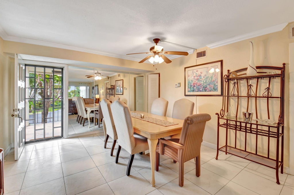 Photo of 5715 FAIRWAY PARK Drive #201, Boynton Beach, FL 33437 (MLS # B26060277)