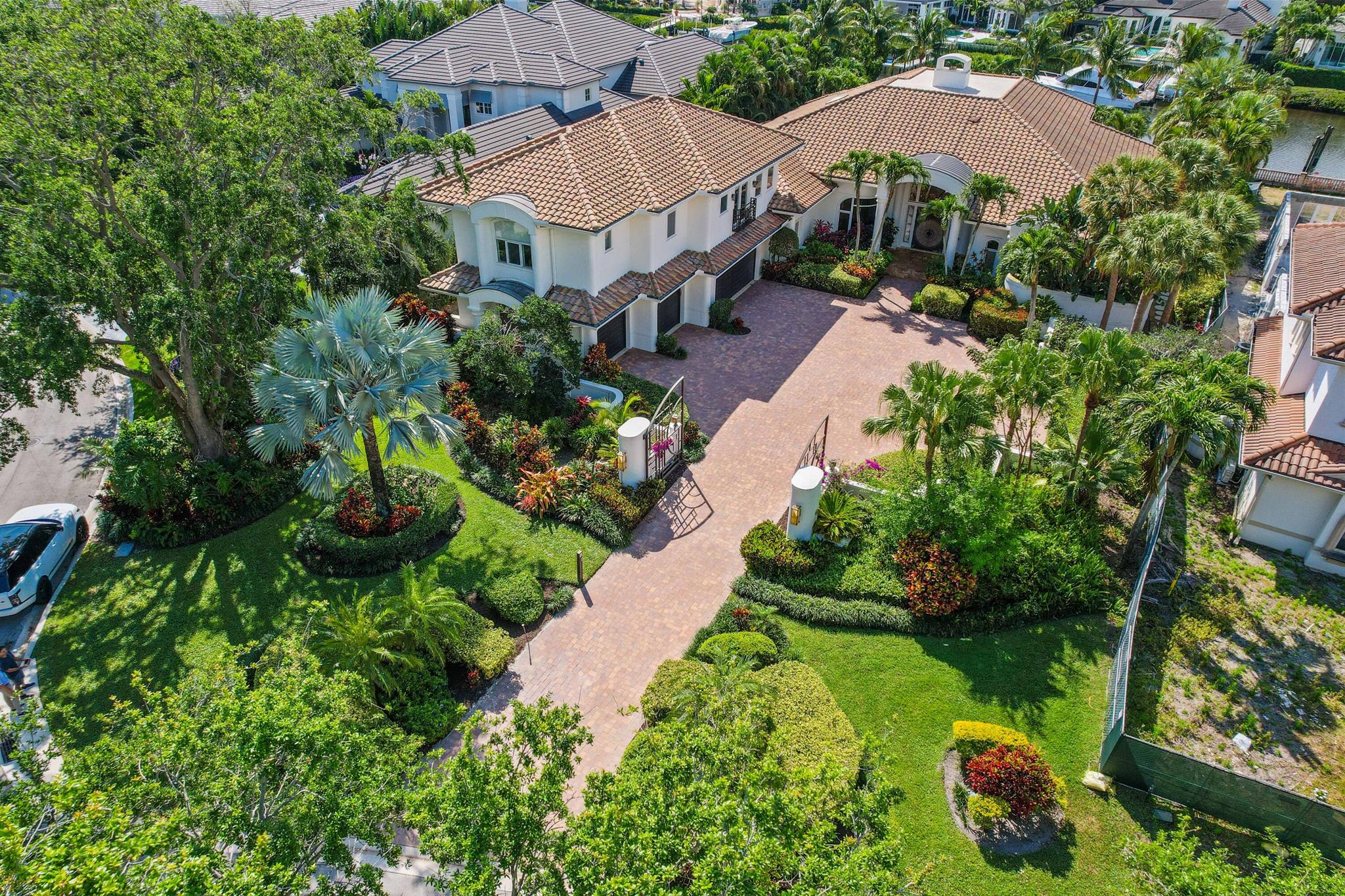 Welcome to your slice of paradise in Admirals Cove!Immerse yourself in the lap of luxury along the enchanting oak-lined streets of Admirals Cove, where this waterfront marvel awaits. With its coveted Southern Exposure and an impressive 119 feet of water frontage, this gem promises a lifestyle of unparalleled bliss.Picture yourself just moments away from the Intracoastal Waterway, nestled on a sprawling .62-acre estate lot primed for either a stunning renovation or the creation of your dream home. Opportunities as extraordinary as this are a rare find within the exclusive confines of Jupiter's most sought-after waterfront community, but now, the chance to indulge in the finest things in life is within your grasp.