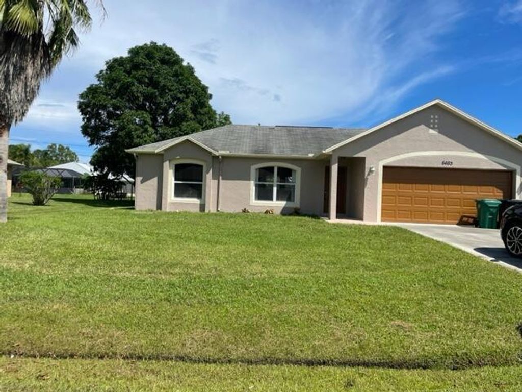 Photo of 6465 NW Friendly Cir Circle, Port Saint Lucie, FL 34983 (MLS # R11026244)