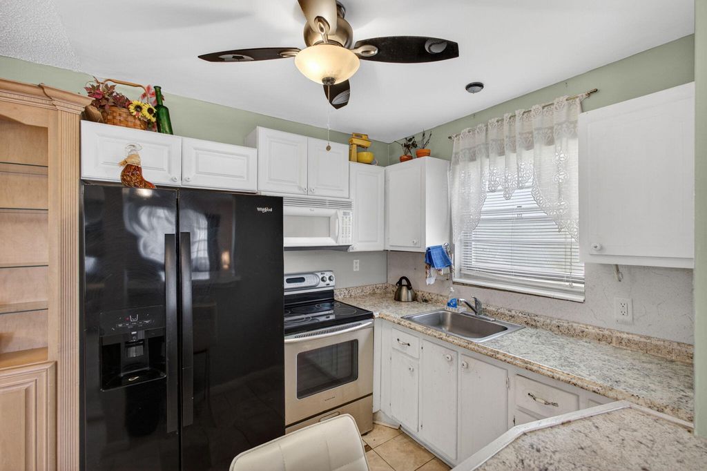 Photo of 157 Camden, West Palm Beach, FL 33417 (MLS # B26024536)