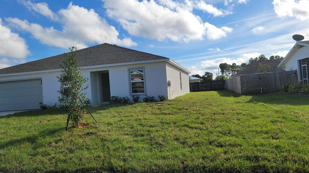 Photo of 326 SW Duxbury Avenue, Port Saint Lucie, FL 34983 (MLS # R10766573)