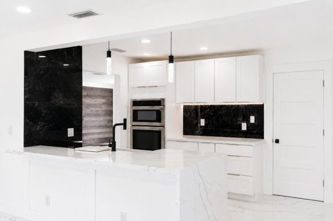 Photo of 1009 Leisure Lane, Boynton Beach, FL 33426 (MLS # B26029515)