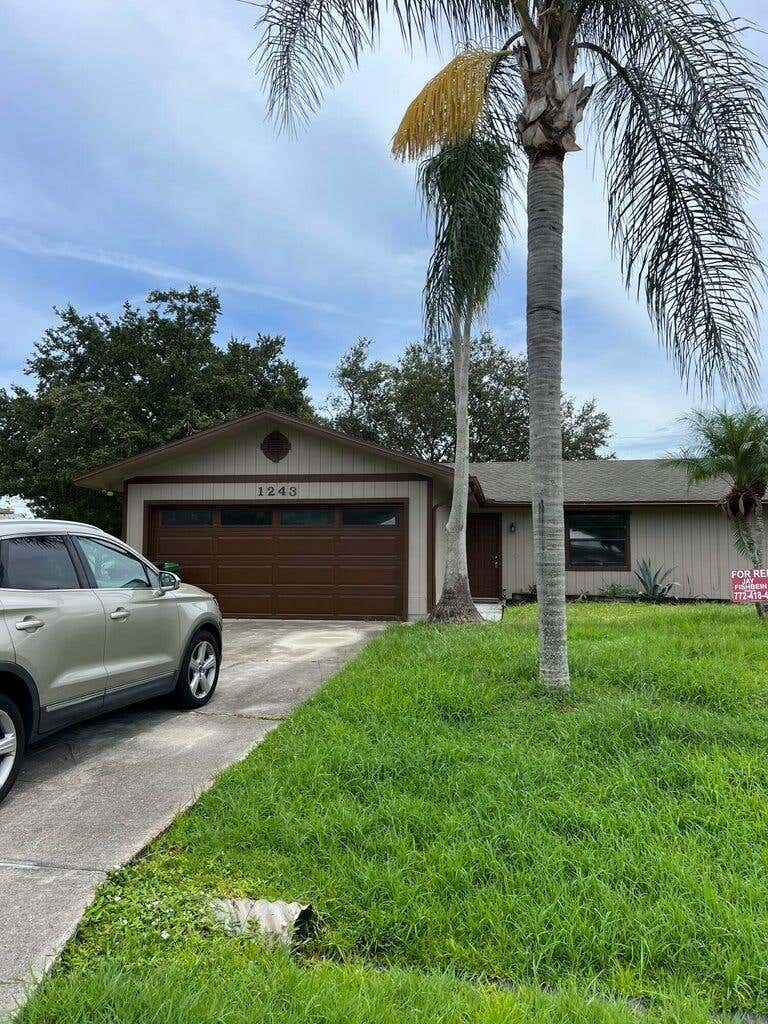 Photo of 1243 SW Heather Street, Port Saint Lucie, FL 34983 (MLS # R10970208)