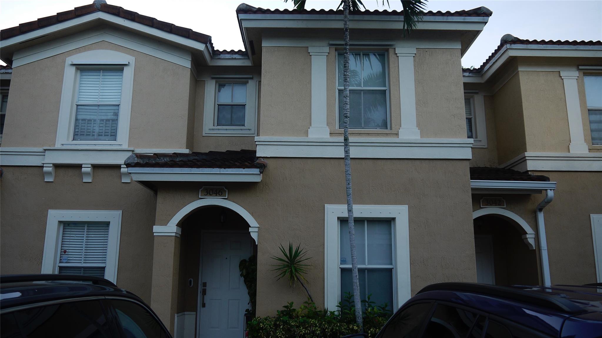 Modern 3-bedroom, 3-bath townhouse-style condo with one full bedroom and bath on the first floor. Features include an upgraded kitchen, laminate flooring throughout, and contemporary wire/cable stair railings. No rear neighbors for added privacy. Offered fully furnished at $3,200 per month