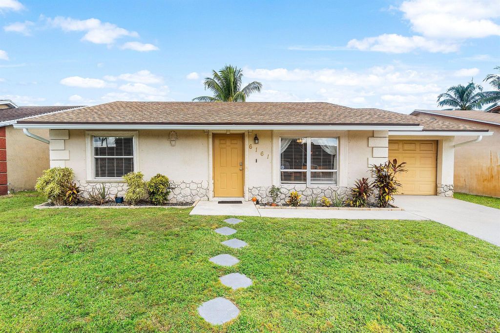 Photo of 6161 Honeywood Way, Lake Worth, FL 33463 (MLS # R11138604)